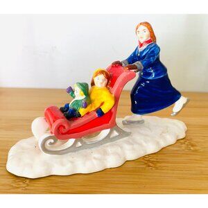Department 56 Skater Mom Pushing Sleigh Holding Children Christmas Village